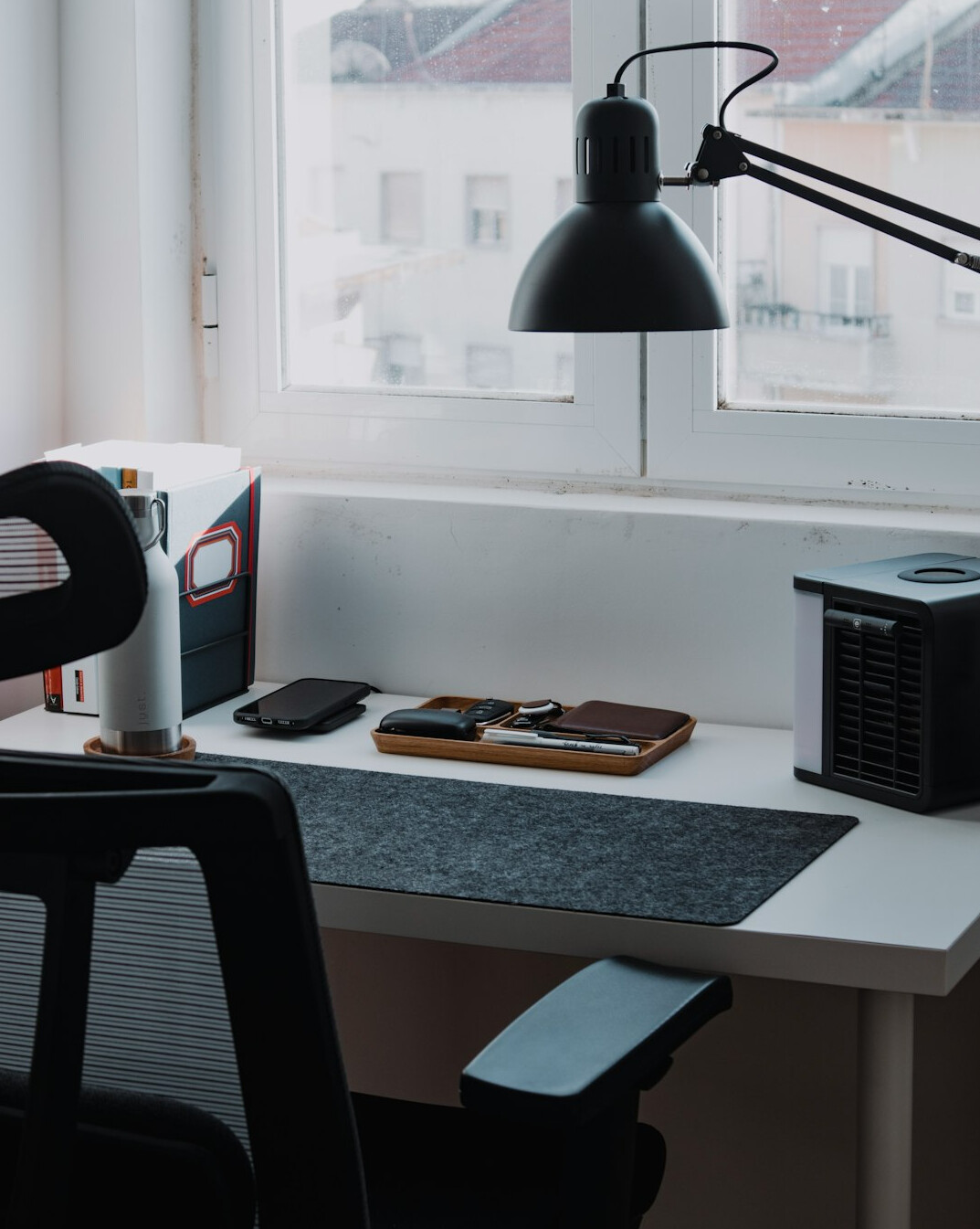 Fact-checking desk with documents and laptop