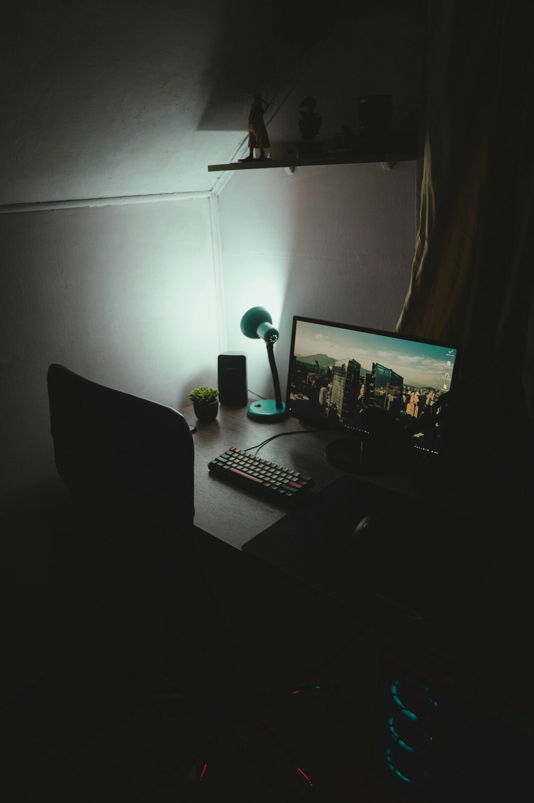 Editor working at a desk with monitors